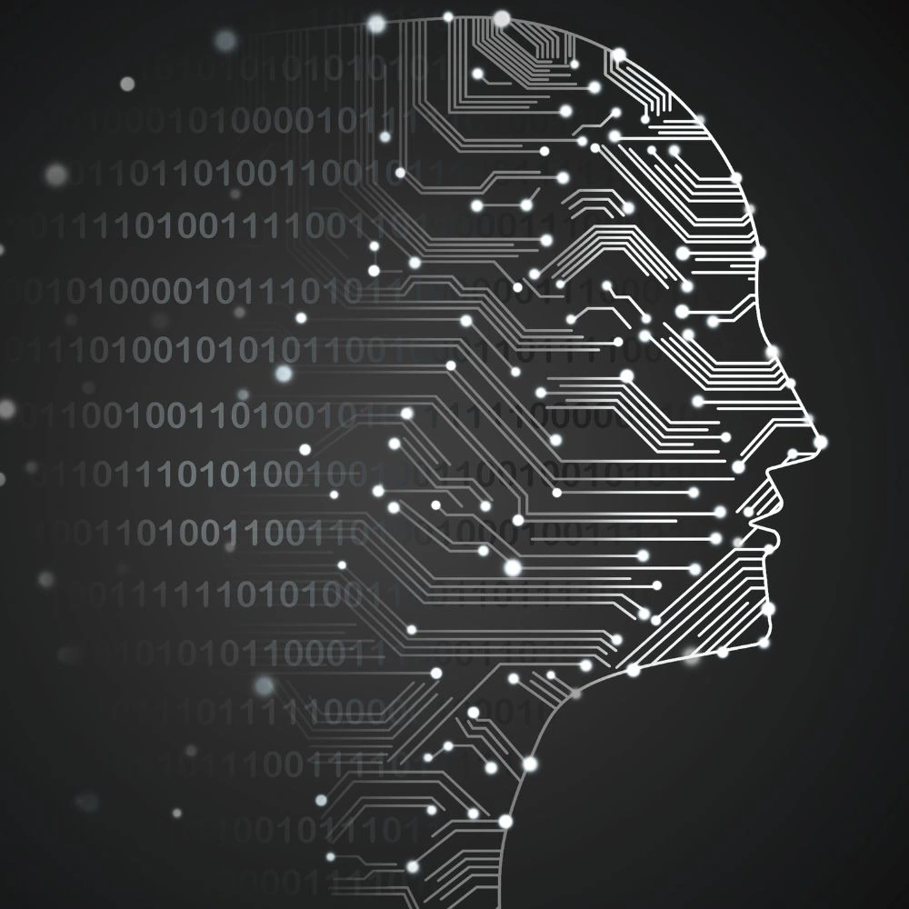 A face construncted from circuits and 1s and 0s, representing AI